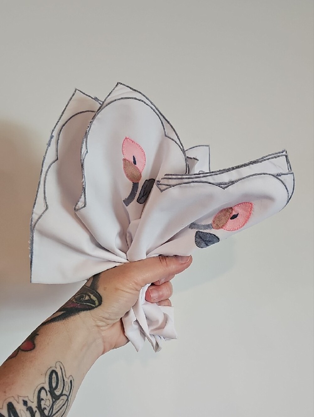 White Embroidered Dinner Napkins with Floral Accent